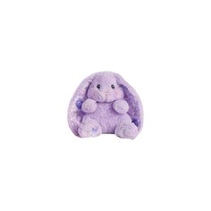 a purple stuffed animal sitting on top of a white surface