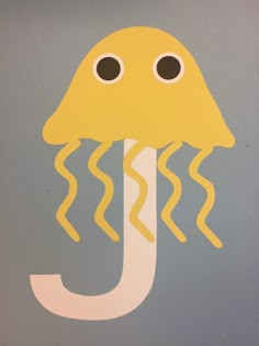 an image of a yellow jellyfish with eyes