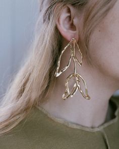 Beloved Bloom Earrings in Gold – Closed Caption Pierced Metal Earrings For Spring, Metal Drop Earrings For Spring, Modern Metal Earrings For Spring, Modern Gold Earrings For Spring, Pierced Leaf-shaped Metal Earrings, Metal Leaf Shaped Earrings, Metal Leaf-shaped Pierced Earrings, Elegant Leaf-shaped Metal Earrings, Leaf-shaped Metal Earrings For Party