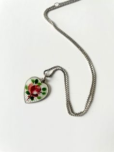 Beautiful Antique  Norwegian Enamel Sterling Necklace.Enamel floral Rose design on the pendant, beautiful delicate design and in stunning cond. Signed on pendant Sterling Made In Norway 925S. Opro Hallmarks for designer. Pendant 0,5 inc wide and long. Sterlinb chain signed 925. 14 Inc long Norwegian Jewelry, Sterling Necklace, Enamel Necklaces, Delicate Design, Enamel Jewelry, Rose Design, Vintage Earrings, Made In, Pendant Necklaces