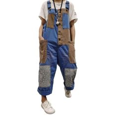 Introducing the 2023 Autumn Collection's pieced-together women's denim overall. a triumphant blend of the best of the Y2K era and today's trend-setting fashion!Why You'll Love It: Y2K-Inspired: Take a trip down memory lane with this statement-making piece. designed to pay homage to the millennium's legendary fashion sense. Patchwork Perfection: Its vibrant patchwork pattern speaks of a carefree. modern style that's both eye-catching and timeless. Baggy and Bold: Its loose silhouette and oversize Casual Denim Overalls With Patchwork, Casual Cotton Patchwork Overalls, Casual Baggy Patchwork Overalls, Casual Denim Patchwork Overalls Jumpsuit, Casual Blue Denim Jumpsuit With Patchwork, Blue Utility Overalls For Fall, Denim Blue Patchwork Cotton Overalls, Blue Patchwork Denim Overalls Jumpsuit, Vintage Denim Overalls With Patchwork