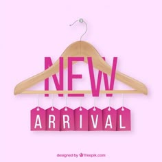 a wooden hanger with clothes hanging from it and the words new arrival written in pink