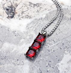 《《  FOR YOUR JOURNEY COLLECTION  》》 THE DETAILS The "SILVER GARNET BAR" Necklace is designed with an incredibly detailed Silver Stainless Steel Three Prong Setting Bar Tag Pendant, with three luxurious Emerald Cut Garnet Cubic Zirconia Gemstones, hung from a Silver Stainless Steel Box Chain available in your choice of length! GEMSTONE BENEFITS GARNET: Known as the Stone of "MANIFESTATION & VITALITY", often worn for its abilities to increase energy by balancing emotions & reducing stressors, clea Jewlery Rings, Necklace Length Chart, Balancing Emotions, Necklace Mens, Increase Energy, Black Two Piece, Jewelry Care Instructions, Garnet Necklace, January Birthstone