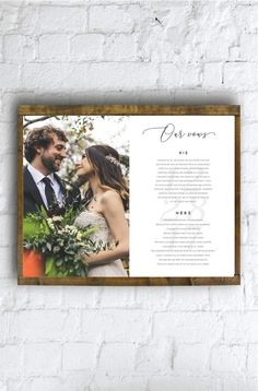 a wedding program is hanging on a brick wall