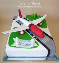 a cake with a plane on top of it