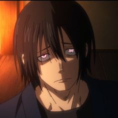 an anime character staring into the distance with his eyes open and dark hair in front of him