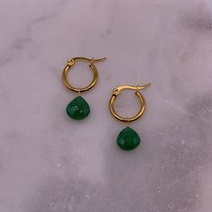 Materials: Stainless steel gold-plated hoop earrings, green onyx.  Sizing + Fit: 15mm hoops. Green Tarnish-resistant Huggie Jewelry, Gold Jade Hoop Jewelry, Green Tarnish-resistant Hoop Jewelry, Hypoallergenic Gold Plated Green Jewelry, Hypoallergenic Green Gold-plated Jewelry, Green Small Hoop Earrings Tarnish Resistant, Small Hoop Green Earrings Tarnish Resistant, Green Tarnish Resistant Hoop Earrings For Gift, Green Tarnish Resistant Small Hoop Earrings