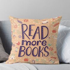 a pillow that says read more books on it