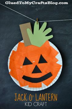 a paper plate pumpkin craft with the words jack o lantern on it