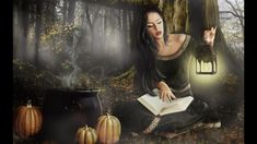 a woman sitting on the ground with a book in her hand next to some pumpkins