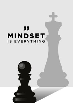 a black and white chess piece next to the words, j mindset is everything