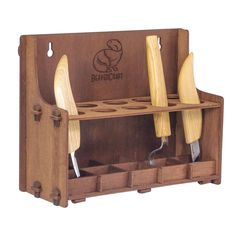 a wooden knife holder with two knives in it's compartments and the handles are made out of wood