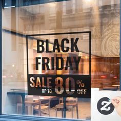 a black friday sale sign in the window of a store