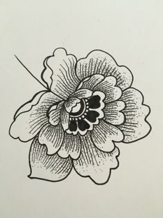 an ink drawing of a flower in black and white