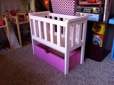 a child's toy crib in a play room