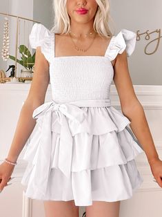 Sweet Sorbet White Ruffle Dress | Sassy Shortcake | sassyshortcake.com Flirty Tiered Skirt Ruffle Dress For Brunch, Flirty Tiered Ruffle Dress For Brunch, White Ruffle Dress With Ruffled Straps For Summer, White Tiered Dress For Party, Cute Mini Dress With Ruffled Straps, White Fitted Ruffle Dress With Ruched Detail, Cute Mini Dress With Ruffled Straps And Ruffles, White Feminine Tiered Skirt Ruffle Dress, White Ruffled Tiered Dress For Party