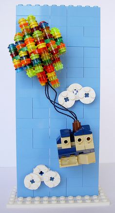 a lego wall with a hot air balloon attached to it