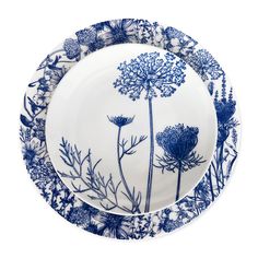 a blue and white plate with flowers on it