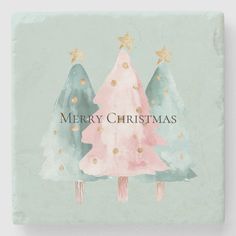 a merry christmas card with watercolor trees and gold stars on the top in pastel green