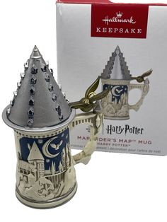 a harry potter mug shaped like a castle