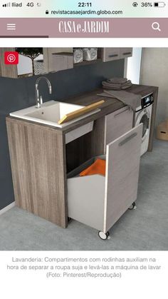 an image of a kitchen with sink and cabinets