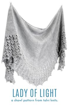 the lady of light shawl pattern is shown in grey and white, with text that reads