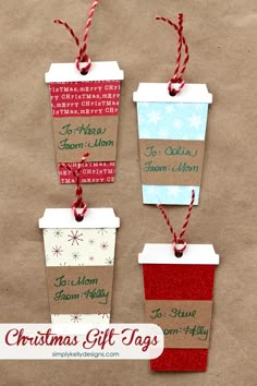 three coffee cups with christmas tags hanging from them