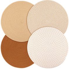 four round placemats in various colors