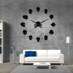 a living room with a couch and a clock on the wall that has skulls in it