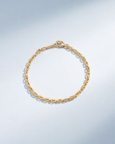 Crafted with 18-karat gold, this block-chain bracelets presents a symphony of four-sided hallow links. Each hollow block interlocks to form a chain that is both lightweight and striking in its thickness. Clean lines make this necklace is a versatile statement piece to wear all day or night. Details 18k yellow gold, rose gold or white gold 7" bracelet inch is adjustable at 6.5" inches 8" inch bracelet is adjustable at 7.5" inches 2.2mm link thickness Ref: GCB132 Yellow Gold Box Chain Bracelet For Everyday Luxury, 14k Gold Chain Bracelets With Rectangular Links, Timeless Box Chain Bracelet For Everyday Luxury, Timeless Yellow Gold Bracelet With Box Chain, Luxury Everyday Gold Bracelet With Box Chain, Fine Jewelry Bracelets With Tarnish Resistant Rectangular Links, Modern Gold Cable Chain Bracelets, Modern Gold Cable Chain Bracelet, Luxury Everyday Chain Bracelet With Link Shape