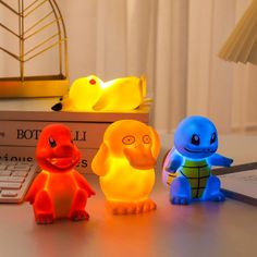 This Pokemon Night Light is a finely crafted, finished model made from durable ABS material. It features a charming Pikachu design that appeals to all genders and ages. The compact dimensions of 7*12cm make it a perfect addition to any space. No remote control is needed, and the light operates on button batteries, which are included for your convenience. With the CE certification, you can trust the safety and quality of this product. Whether you're a fan or looking for a delightful gift, the Pok Pokemon Room Ideas Kids, Pokemon Bedroom Ideas, Pokemon Night, Pokemon Night Light, Pokemon Room, Interesting Decor, Doll Home, Color Box, Led Night Light