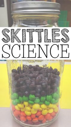 a mason jar filled with chocolate covered candies and the words skittles science