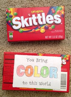 two skittles are sitting on the floor next to each other