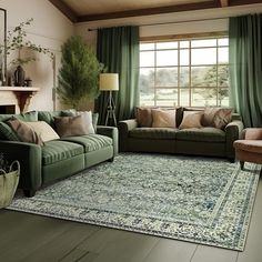 a living room filled with furniture and green curtains