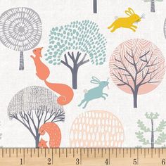 an animal themed wallpaper with trees, animals and circles on white fabric in various colors