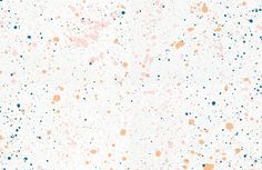 an abstract white background with orange, blue and black dots on it's surface