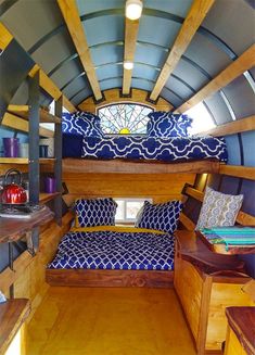 the interior of a tiny house with bunk beds