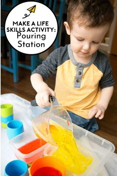 a young boy is playing with colored water in his plastic container, and the words make a life skills activity foaming station