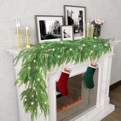 christmas stockings are hung on the mantle in front of two framed pictures and candles,