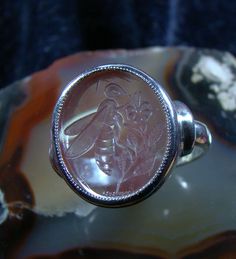 Handmade Engraving Srawberry Intaglio Seal Ring with Bee. Srawberry Quartz; 16x14mm; Size; 6,5US; 52 EU; 17,2mm; Weight; about 4,83grams; Material; Sterling Silver( 925) Sterling Silver Signet Ring With Intaglio, Cameo Signet Ring, Silver Handmade Collectible Signet Ring, Victorian Hallmarked Silver Signet Ring, Bumble Bee Signet Ring, Seal Ring, Signet Rings, Ring Handmade, Signet Ring