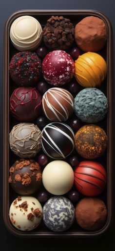 an assortment of different types of chocolates in a box