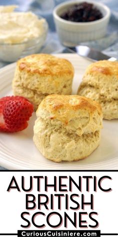 three biscuits on a white plate with strawberries and cream in the background text reads authentic british scones