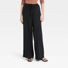 These High-Rise Wide-Leg Linen Pull-On Pants from A New Day™ make a great pick for warm-weather wear. Fashioned in comfortable wide-leg silhouette, they bring relaxed style to your look. The functional drawstring on the pull-on waist lets you get the perfect fit with every wear, and the functional pockets provide space for on-the-go essentials. A New Day™: Style that goes wherever you do. Wide Leg Black Pants Outfit, Wide Leg Black Pants, Brown Linen Pants, Mint Pants, Black Pants Outfit, Black Linen Pants, Side Zip Pants, Boho Clothes, Black Wide Leg Pants