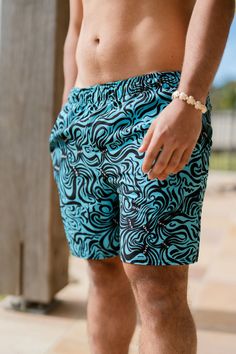 These swim trunks have everything you need for a hot summer day—they’re quick-drying and breathable, have multiple pockets for your belongings, and feature a silky, anti-chafe inner liner. Get yours now! • Fabric composition: 91% recycled polyester, 9% spandex • Liner composition: 92% polyester, 8% spandex • Four-way stretch water-repellent microfiber fabric • Anti-chafe mesh inner liner • Elastic waistband with drawcord • Mesh pockets • Small inside pocket for valuables • UPF 50+ Underwater Plants, Anti Chafing, Couple Matching, Shorts For Men, Swim Suit Bottoms, Summer Day, Swimsuit Tops, Swim Trunks, Hot Summer