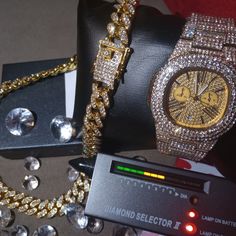 18" Chain & Watch High-End Prototypes & Wholesale Prices. Real Lab Diamonds & Real Gold 4x's Over No Tarnishing Stainless Steel. Jewelers Offer Similar Lab Diamond Pieces For $400-$1k+ ... Real Diamonds, But They’re Not Worth Much Because They've Been Produced In The Lab. Vvs Clarity. They Look Identical To Natural Earth Diamonds The Only Difference Is The Price Tag. Long Lasting Quality *They Will Not Tarnish If You Clean With Mild Soap & Never Use Harsh Chemicals. "Look Like Money Without Overspending" Music Videos, Events, Photos, Entertainment Industry Fast Insured Shipping Positive Reviews Thank You For Shopping With Queenie Luxury Diamond Watch With 17 Jewels As Gift, Gold Chain Watch As A Gift, Gold Watches Suitable For Gifts, Timeless Chain Watches As Gifts, Designer Gold Jewelry And Watches With Diamond Hour Markers, Designer Gold Jewelry With Diamond Hour Markers, Designer Diamond Watches For Gift, Luxury Cuban Link Jewelry For Gift, Luxury Cuban Link Jewelry As Gift