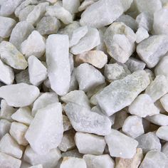 some white rocks are piled together and ready to be used as decorating material or decoration