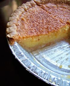 a pie sitting on top of a metal pan