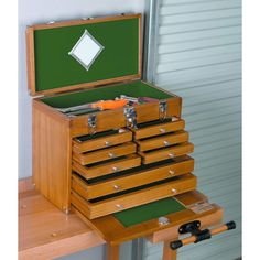 a large wooden chest with many drawers