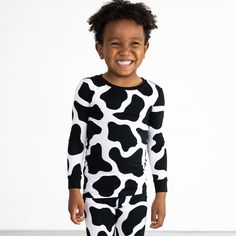 Spotted: the cutest baby cow! Our Moo Crew print showcases udderly adorable black-and-white spots, perfect for Halloween and beyond. Made from buttery soft and stretchy Lunaluxe Bamboo, these comfy PJs are designed with extra length to fit up-to-3x longer. Pair them with a matching Luxe Bow Headband or a Charlie the Cow Lovey.Made from custom-milled Lunaluxe Bamboo that's gentle on sensitive or eczema-prone skin; Seasonless fabric keeps them cool in the summer & cozy in the winter; No snaps, but Cow Print Pajamas, Cow Pajama Set, Black Kids In Pajamas, Playful Sleep Sets With Character Print, Cow Lovey, Cotton Minnie Mouse Sleepwear, Comfy Pjs, Cute Baby Cow, Baby Cow