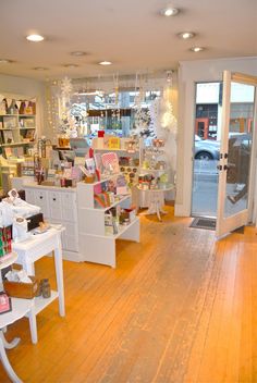 the inside of a store with many items on display